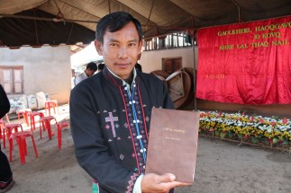 6907.1.1 Mr. Lee's oldest son holding the NT